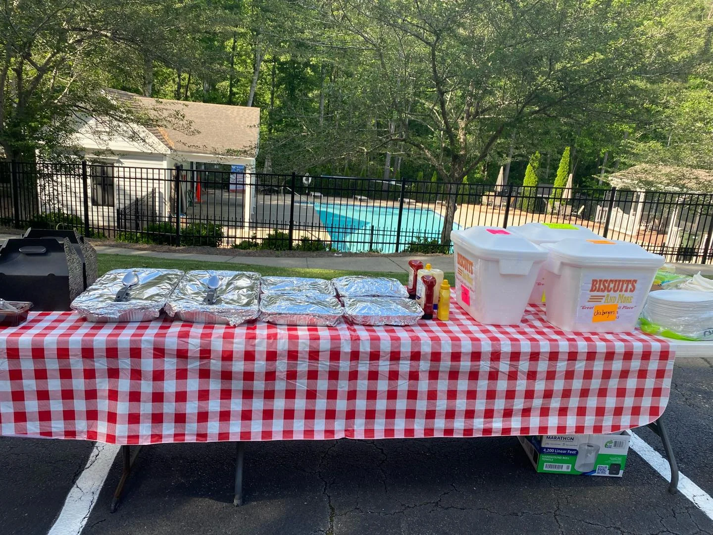 Outdoor food setup with biscuits and condiments