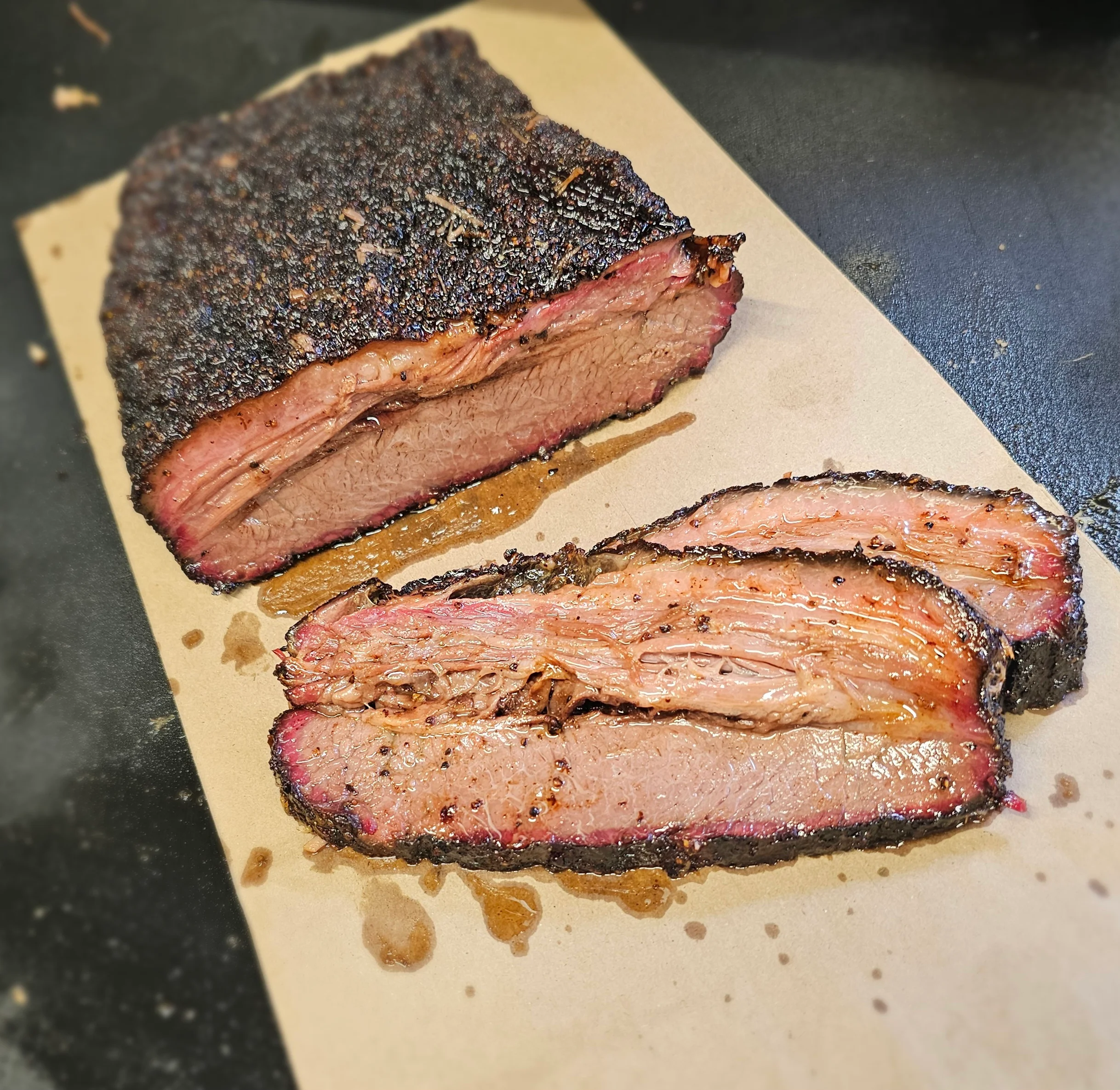 Smoked Texas brisket sliced on butcher paper