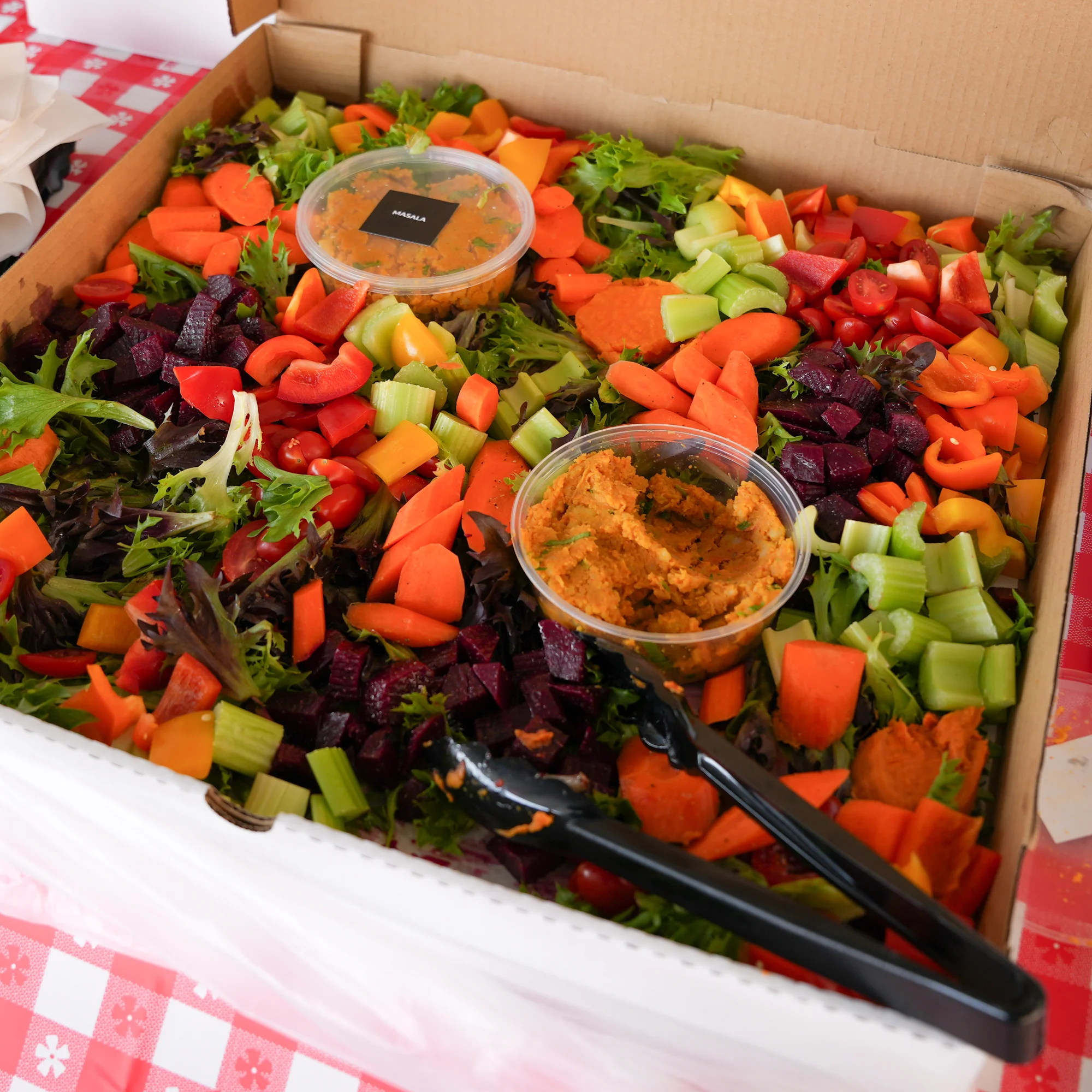 Vibrant Mediterranean mezze platter with fresh vegetables and dips