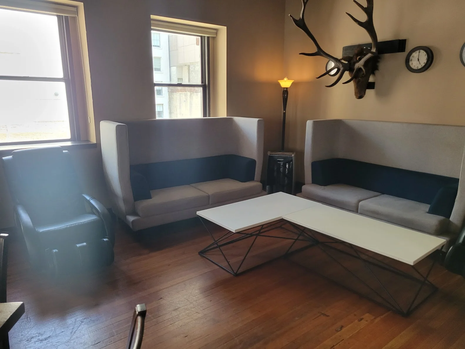 Cozy lounge area with modern seating and warm lighting