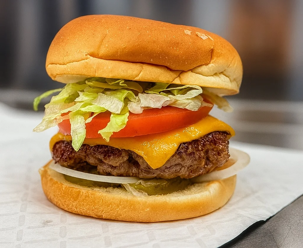 Classic American cheeseburger with fresh toppings