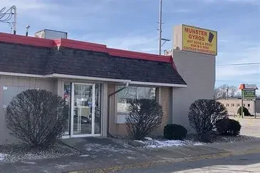 Exterior view of Munster Gyros restaurant with signage