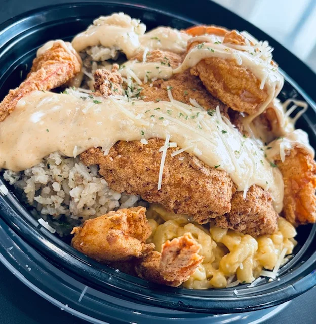 Southern-style chicken and shrimp bowl with creamy sauce