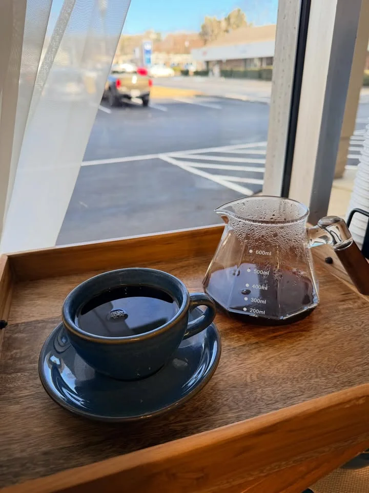 Freshly brewed coffee served in a cozy café setting
