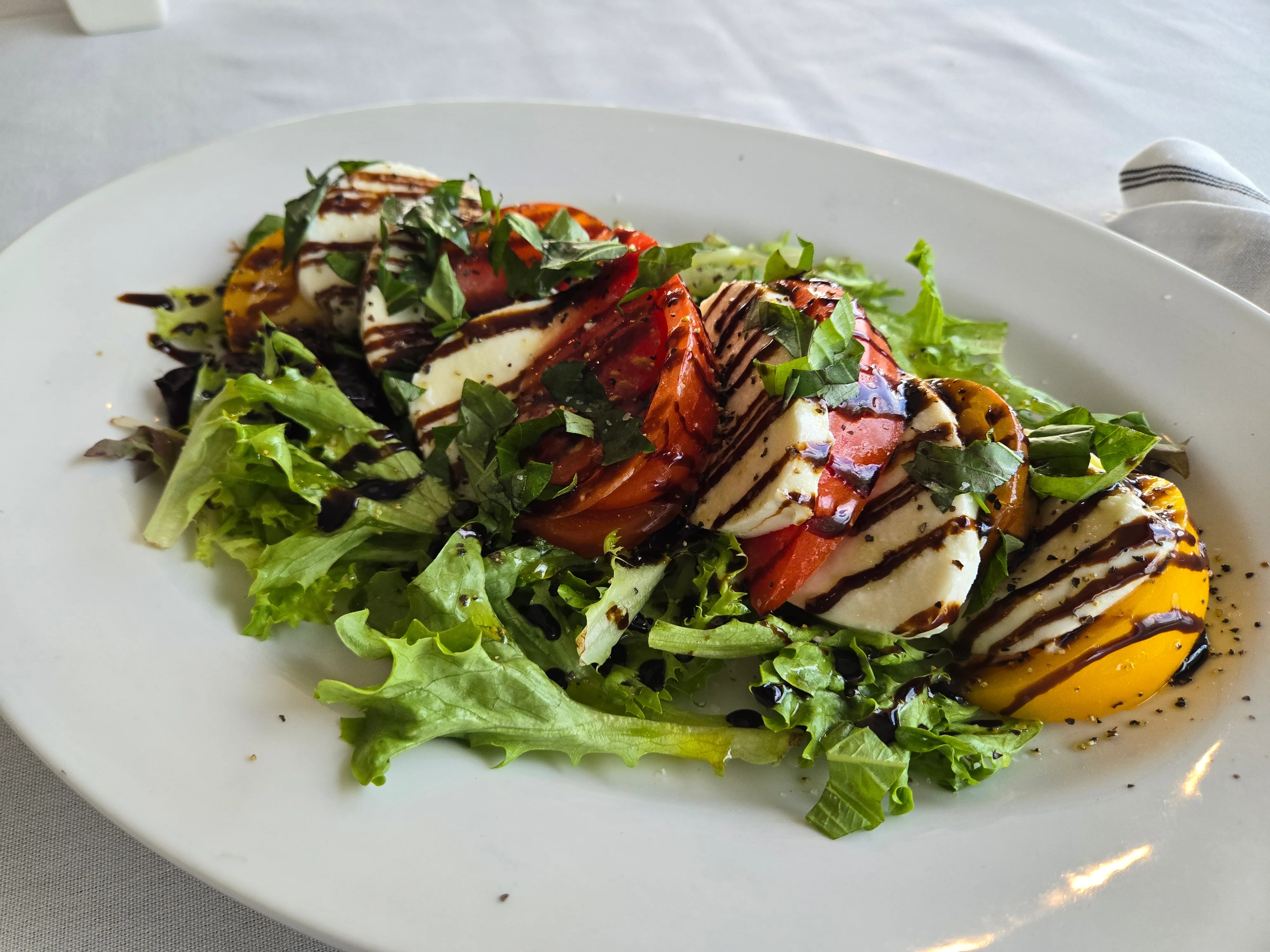Caprese salad with fresh mozzarella and basil