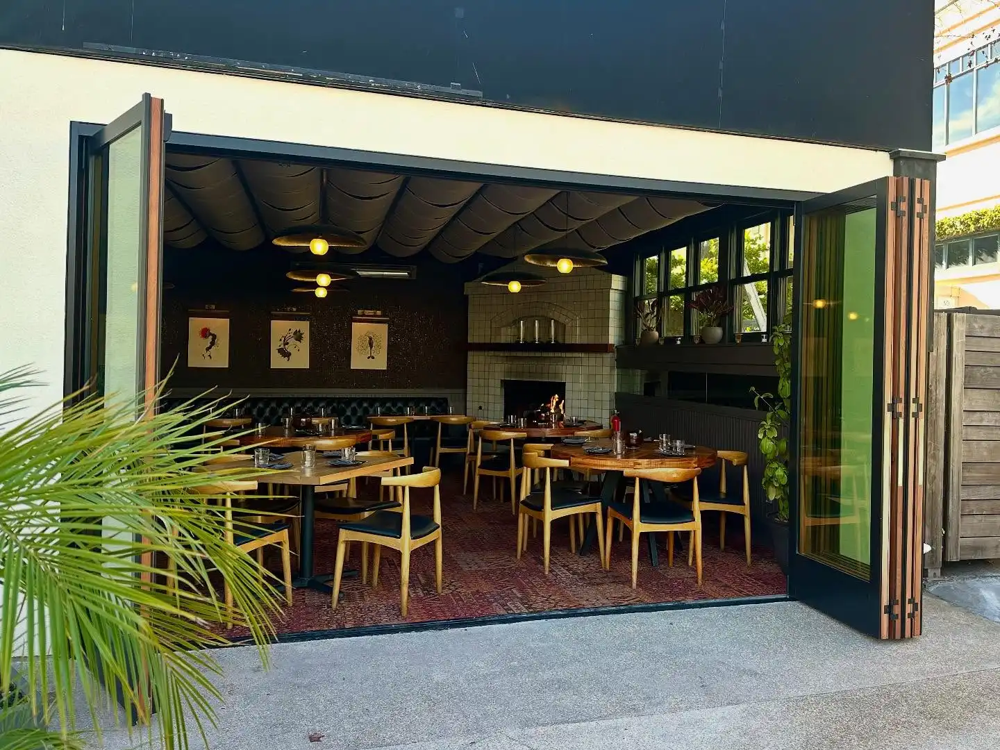 dining room with doors open to the outside area