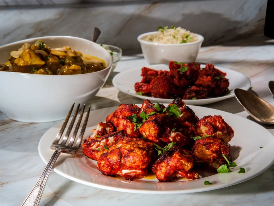 Indian cauliflower tikka with curry and rice