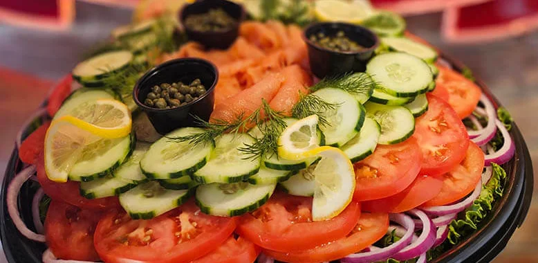 Fresh bagel platter with smoked salmon and vegetables