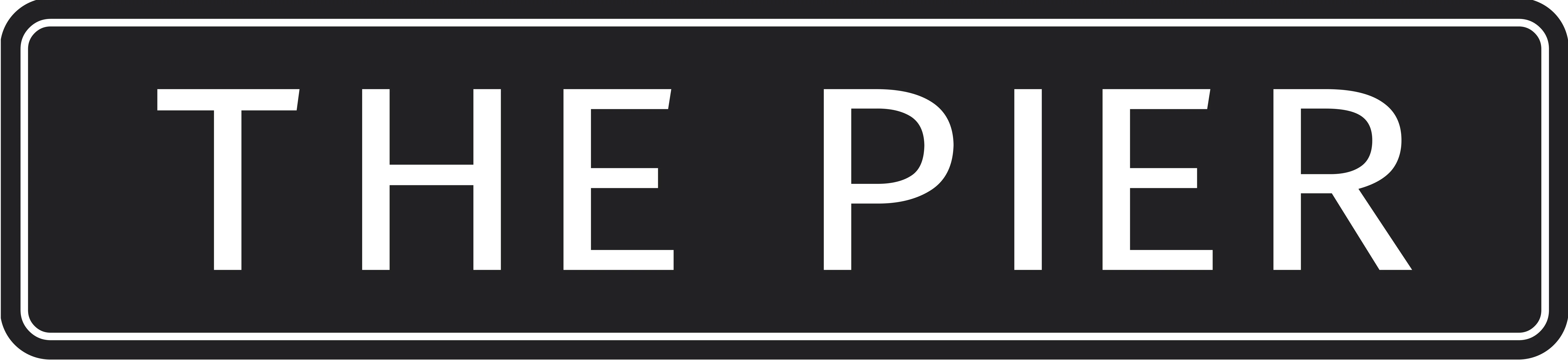 Sign for 'The Pier' restaurant with bold lettering