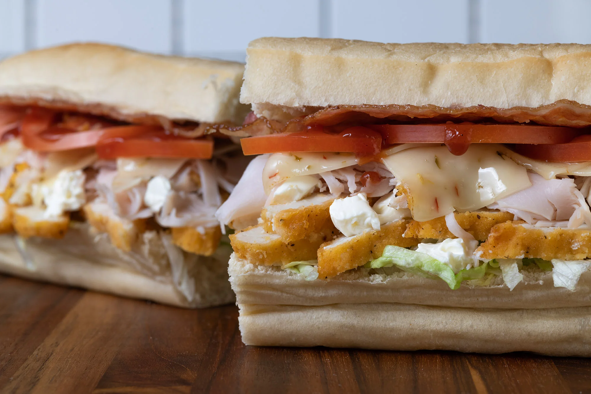 Delicious sub sandwich with turkey and crispy chicken
