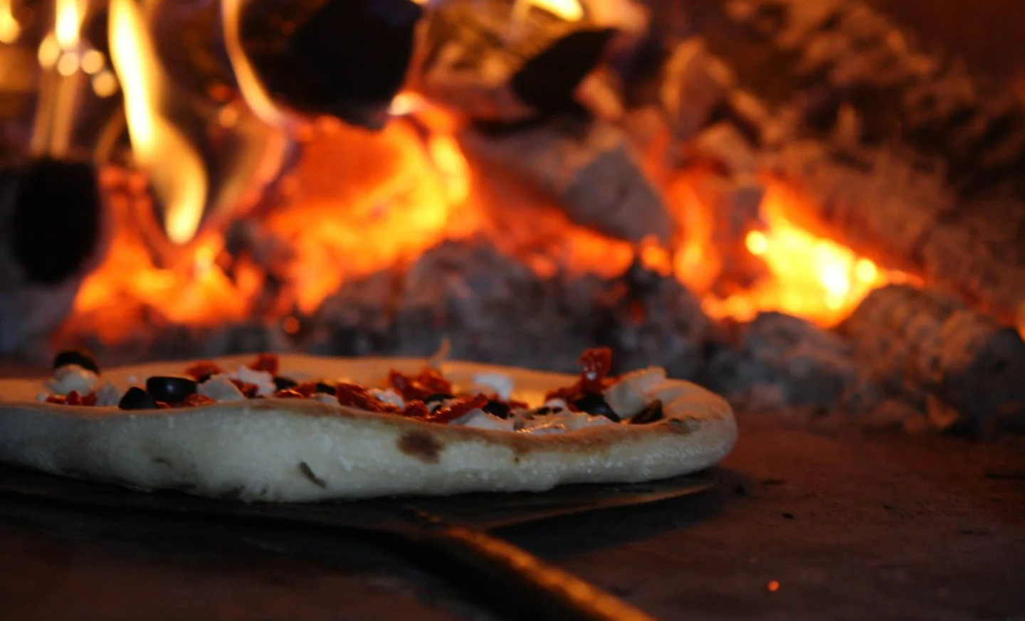 Wood Fired Pizza. Fresh From The Fire.