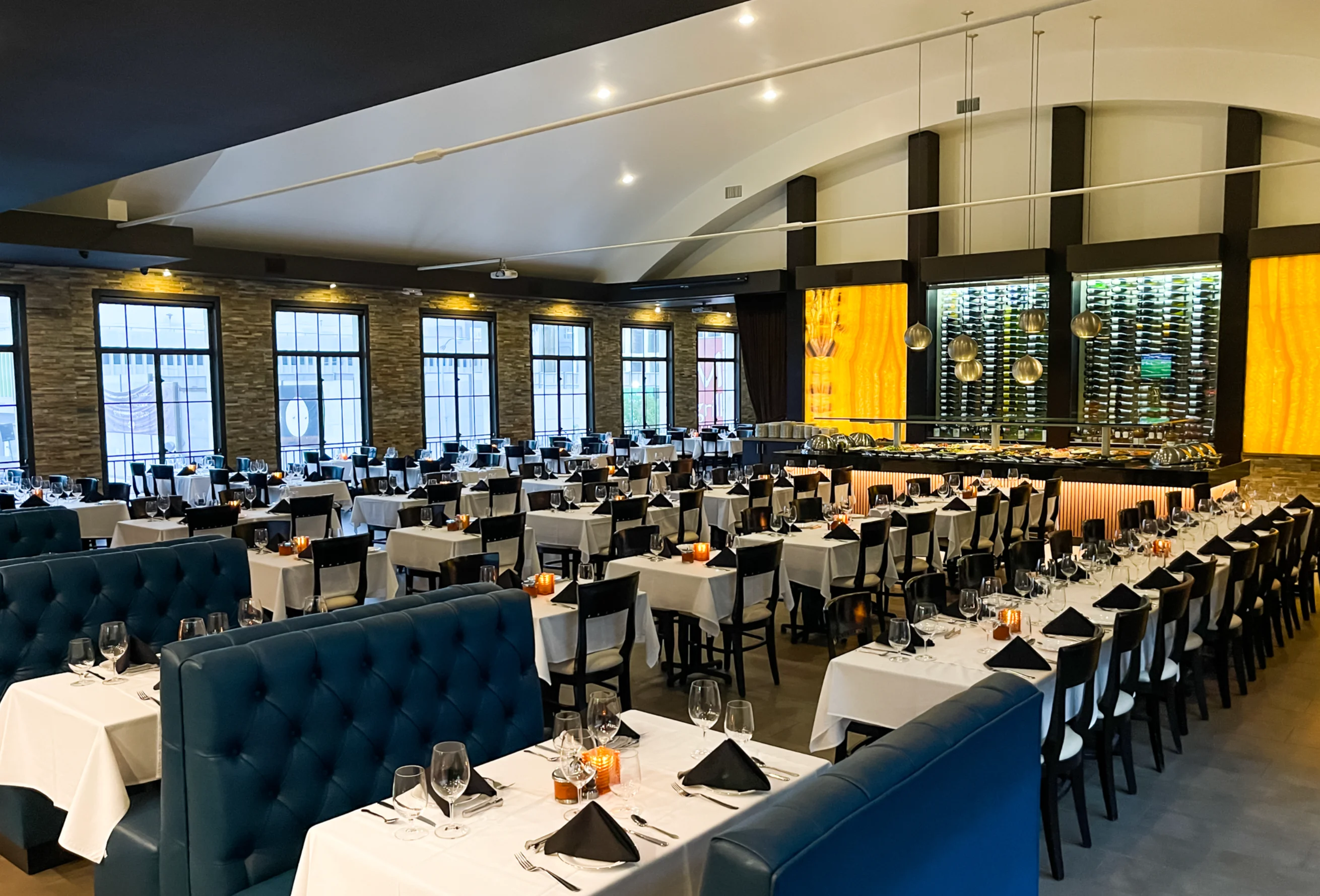 Elegant restaurant interior with stylish seating and warm lighting