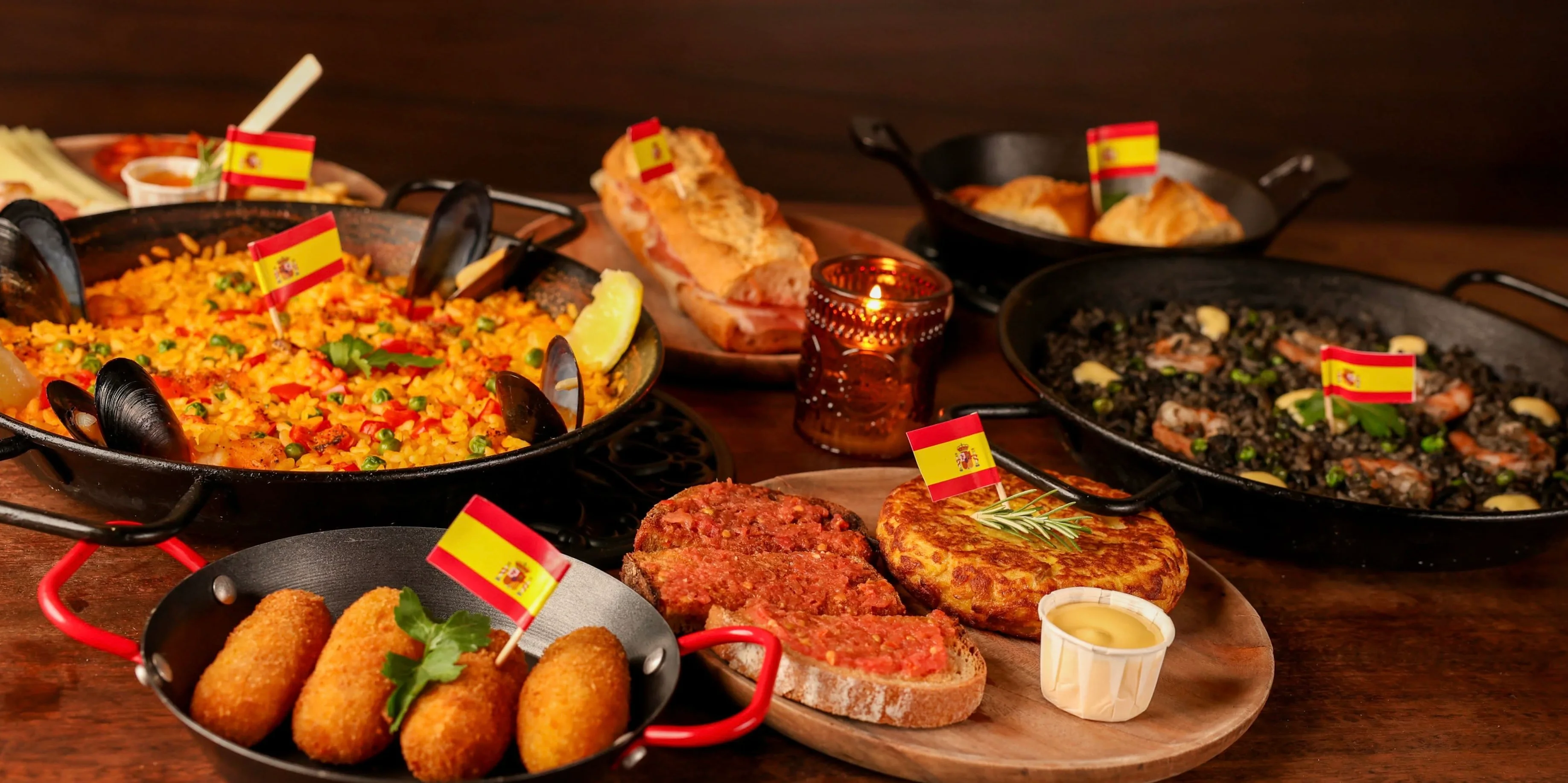 Spanish paella with seafood and traditional tapas