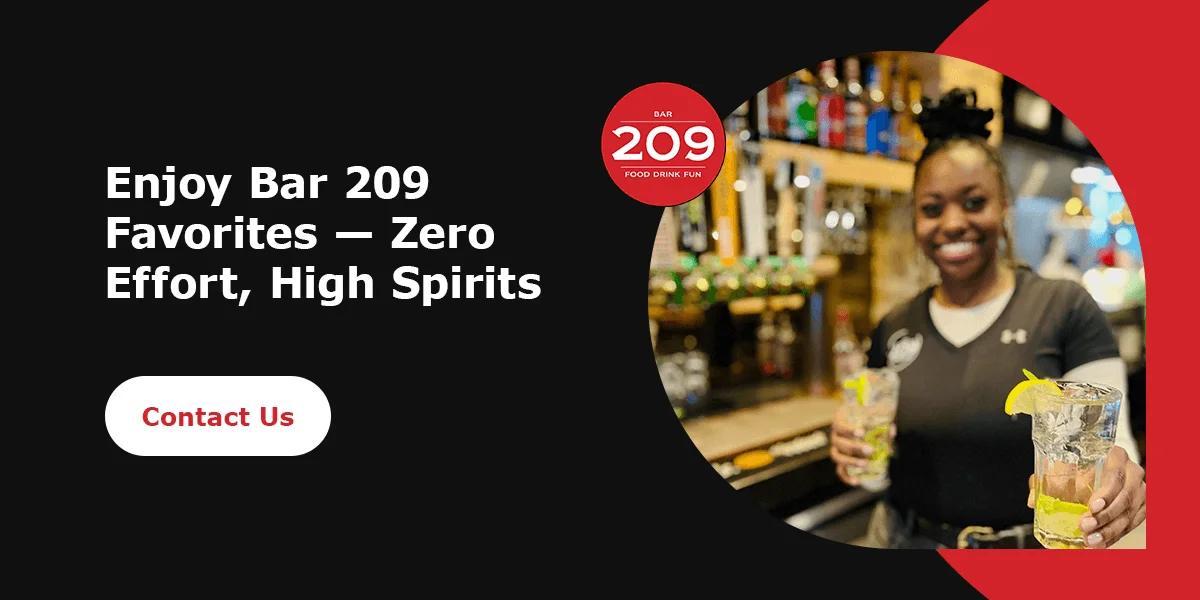 Bartender serving cocktails at Bar 209
