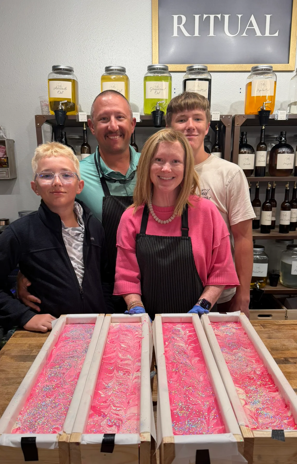 Kajay and her family making Grace Under Fire products at Magnolia Ritual