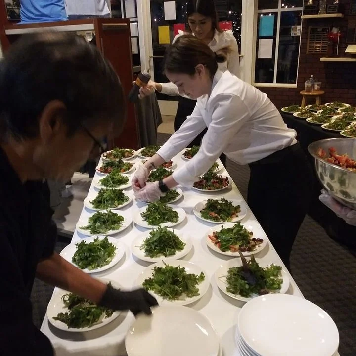A restaurant chef preparing a dish
