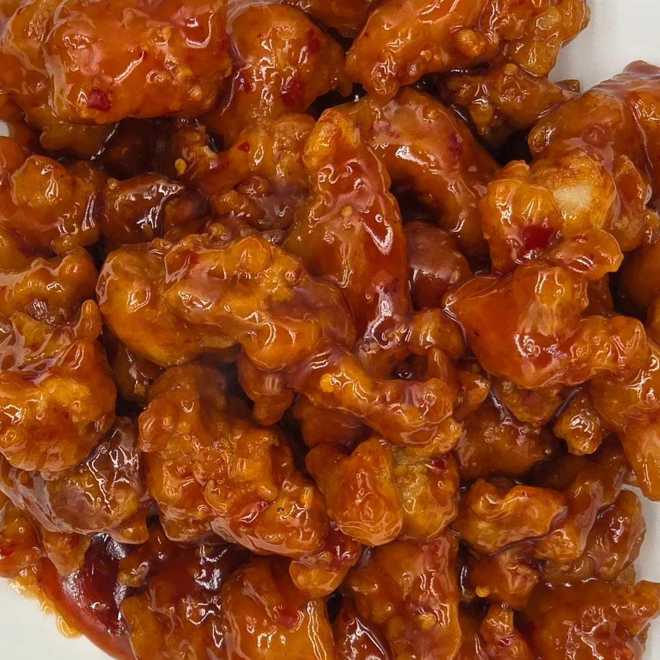 Sweet and sour General Tso's chicken served in a rich sauce