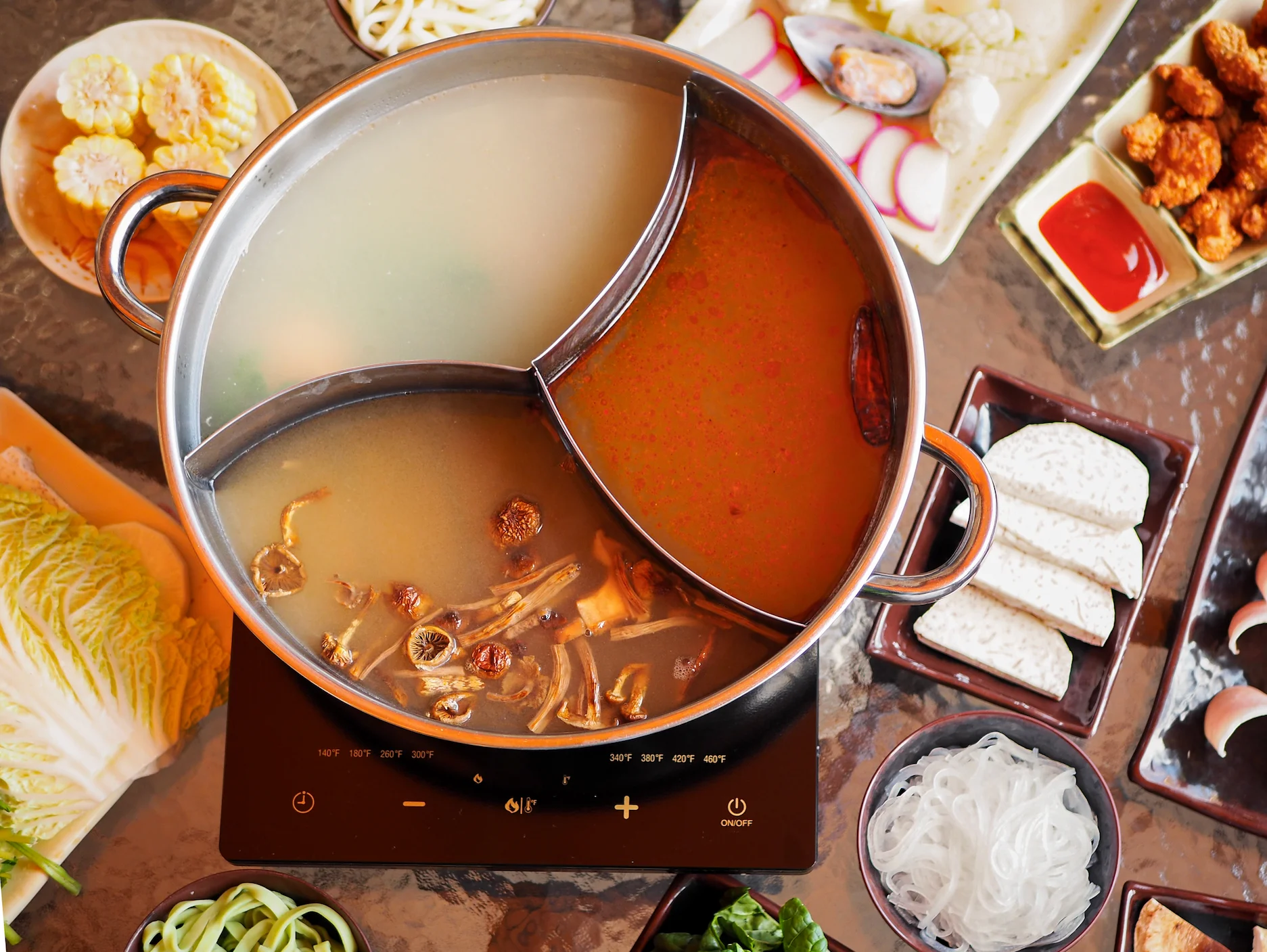 Spicy Sichuan hot pot with assorted ingredients