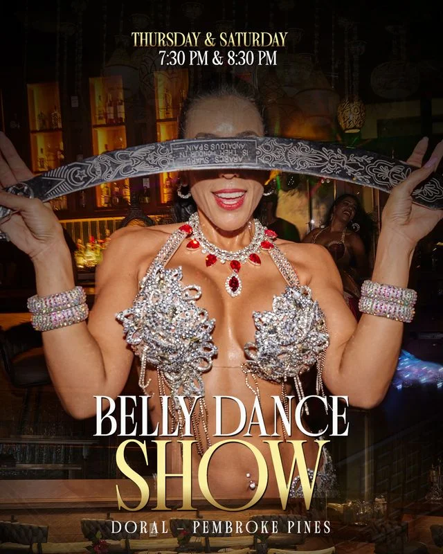 Sufrat Grill’s belly dance show poster featuring a performer.