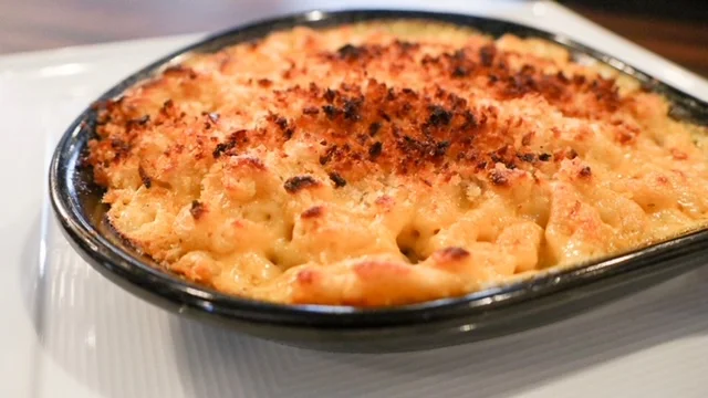 Baked macaroni and cheese in a black dish