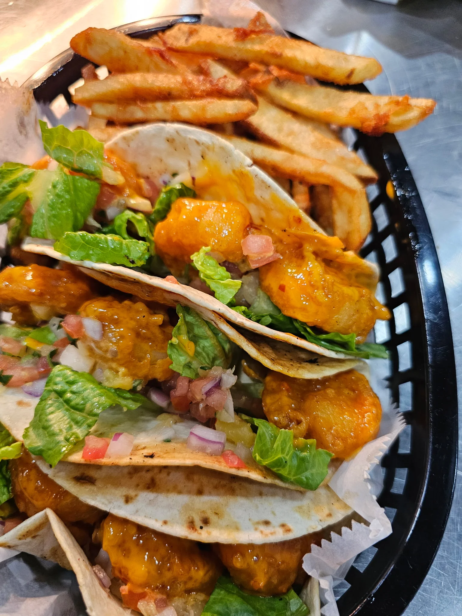 Crispy chicken tacos with fresh toppings