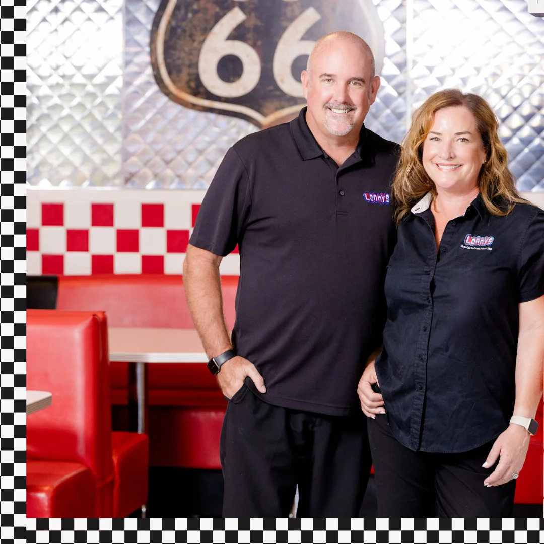 Friendly restaurant owners in a retro diner setting