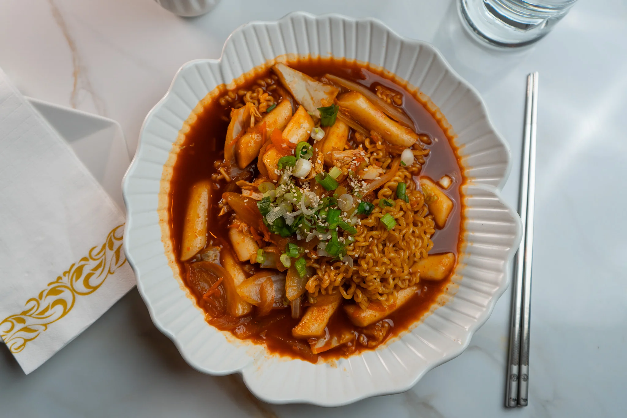 Korean tteokbokki with noodles in spicy sauce