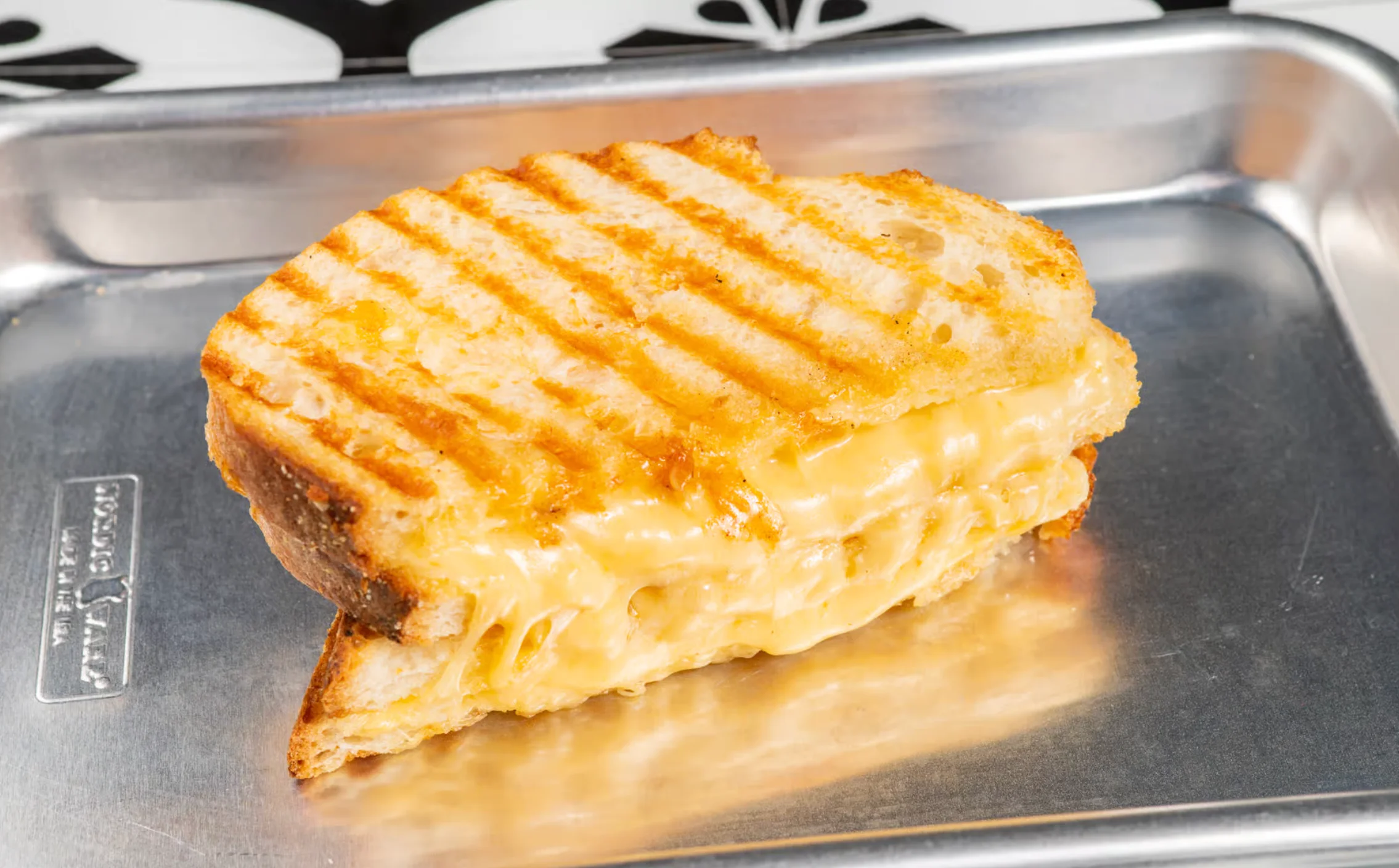 Grilled cheese sandwich with melted cheese