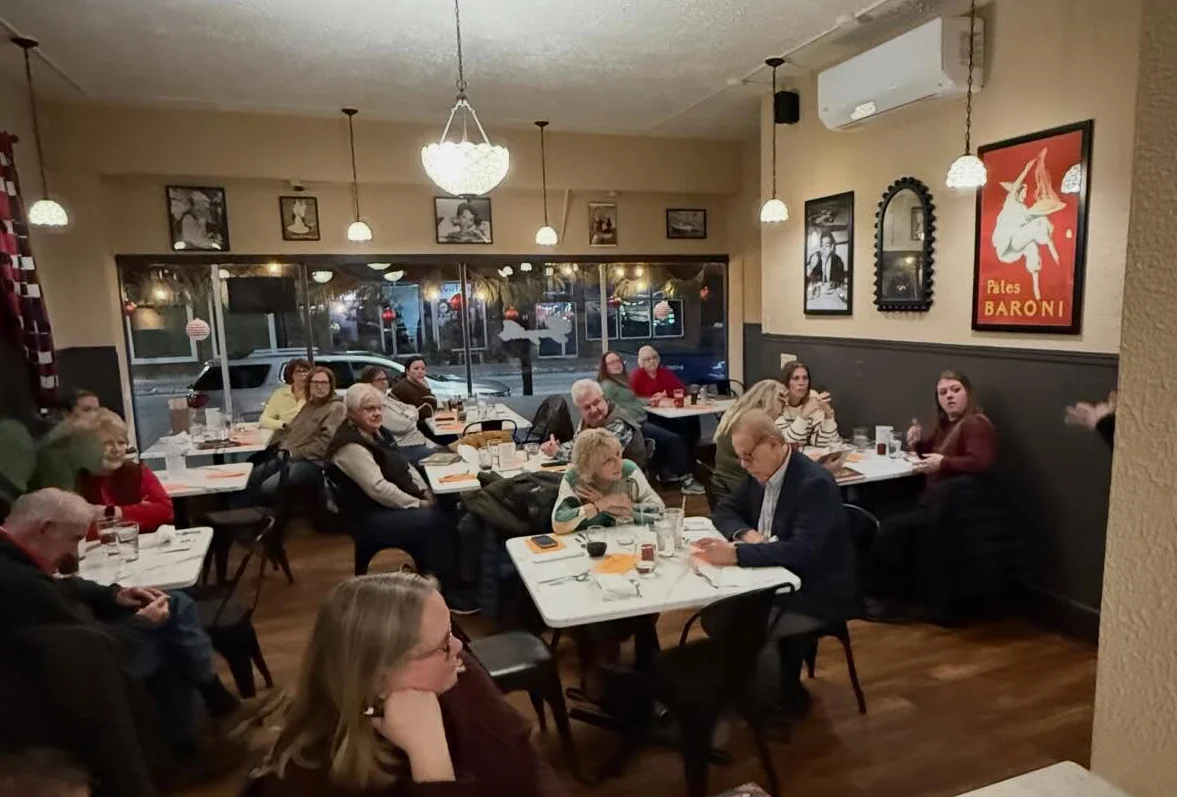 Cozy restaurant interior with diners enjoying a warm atmosphere
