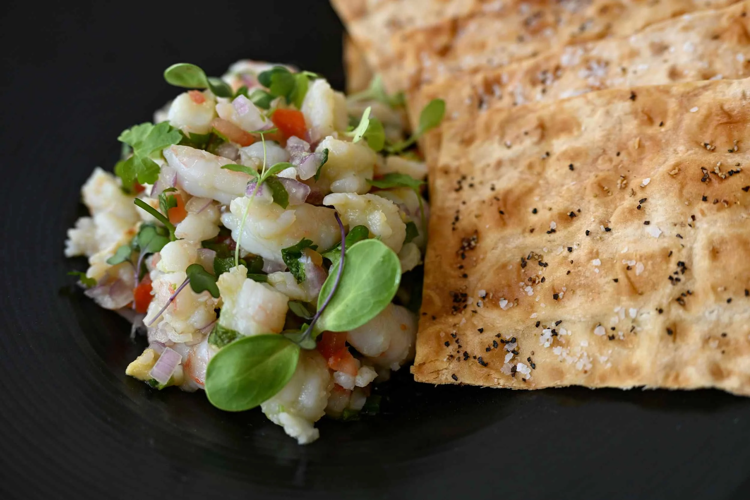 A restaurant chef preparing a dish