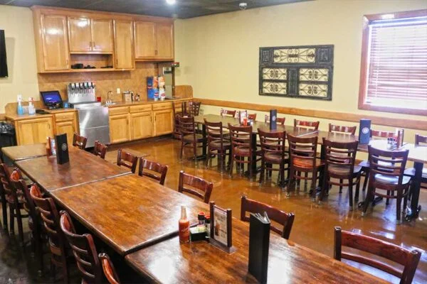 Cozy restaurant interior with wooden tables and chairs