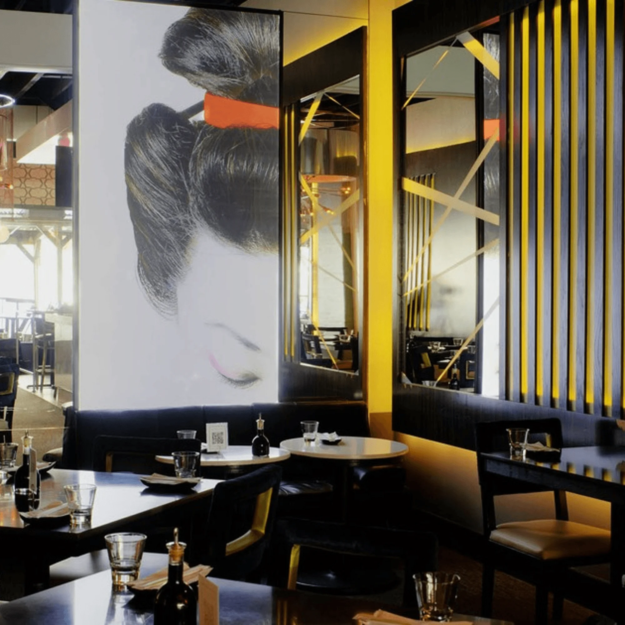 Stylish restaurant interior with modern decor and artistic wall art