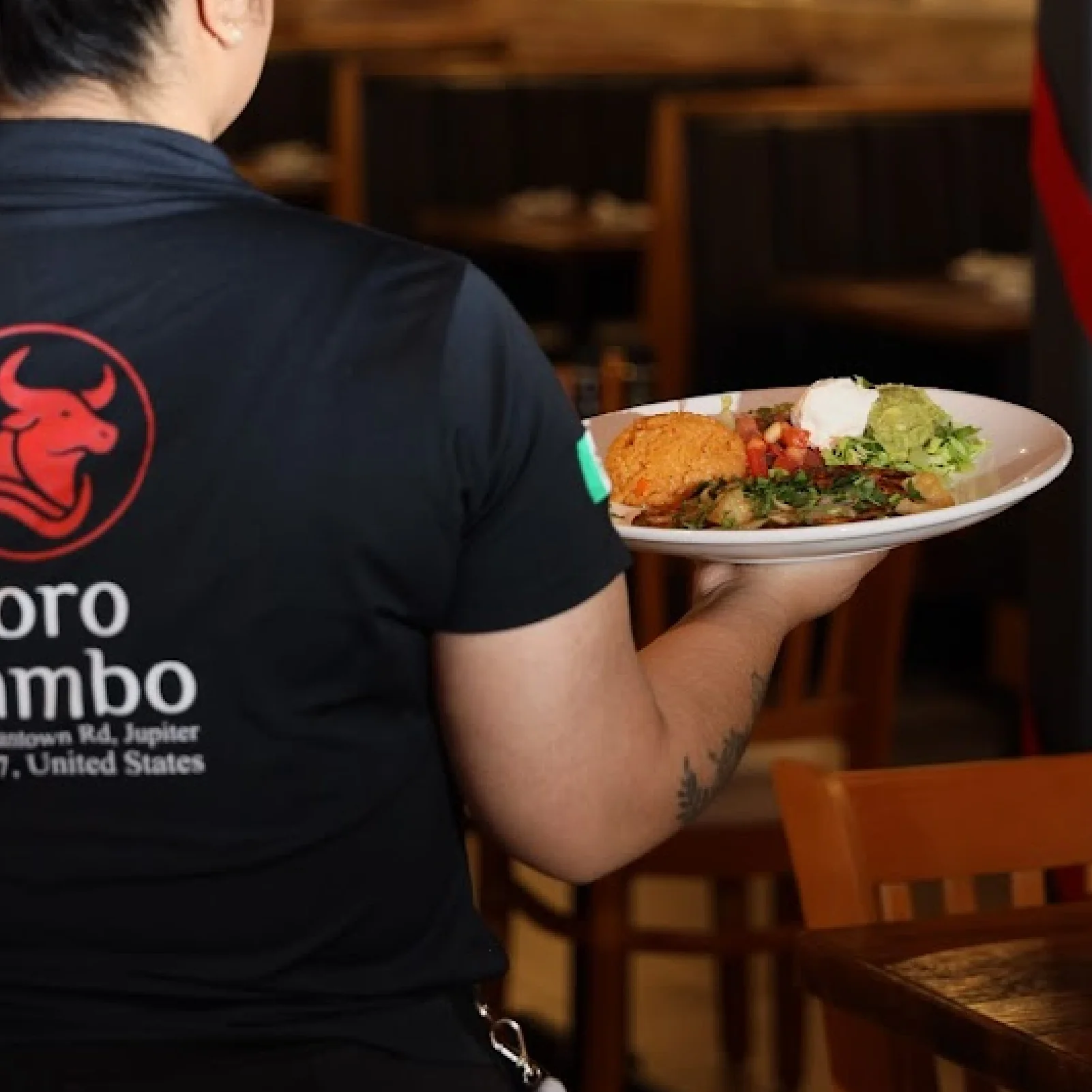 A restaurant chef preparing a dish