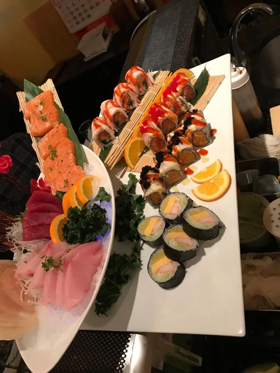 Assorted Japanese sushi platter with sashimi and rolls