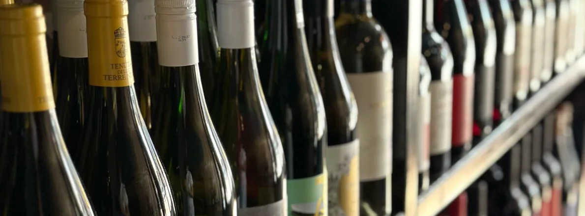 Selection of wine bottles displayed on a shelf