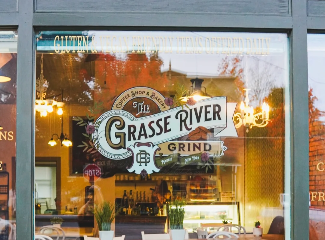 Charming coffee shop window with bakery offerings
