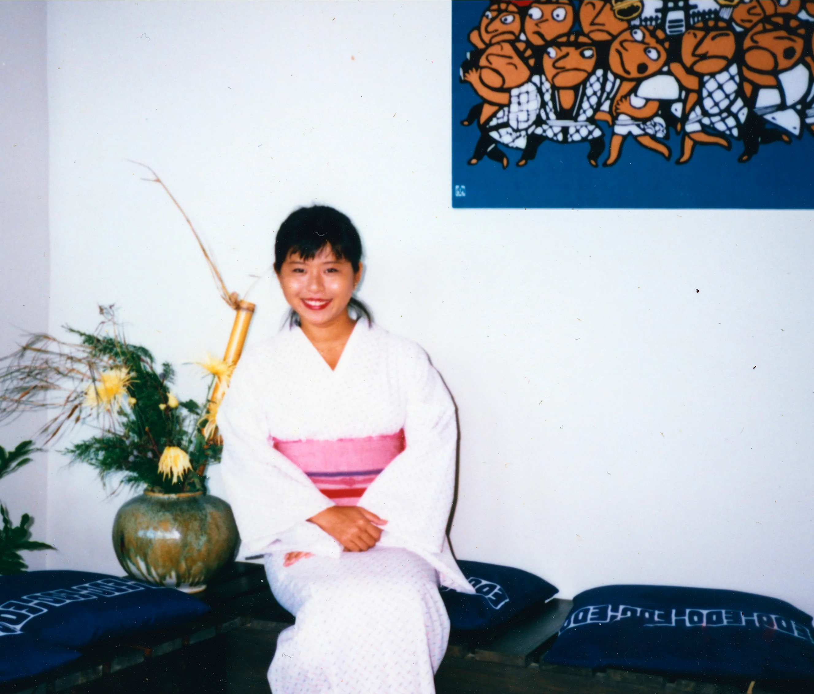 Woman in traditional Japanese kimono with floral decor