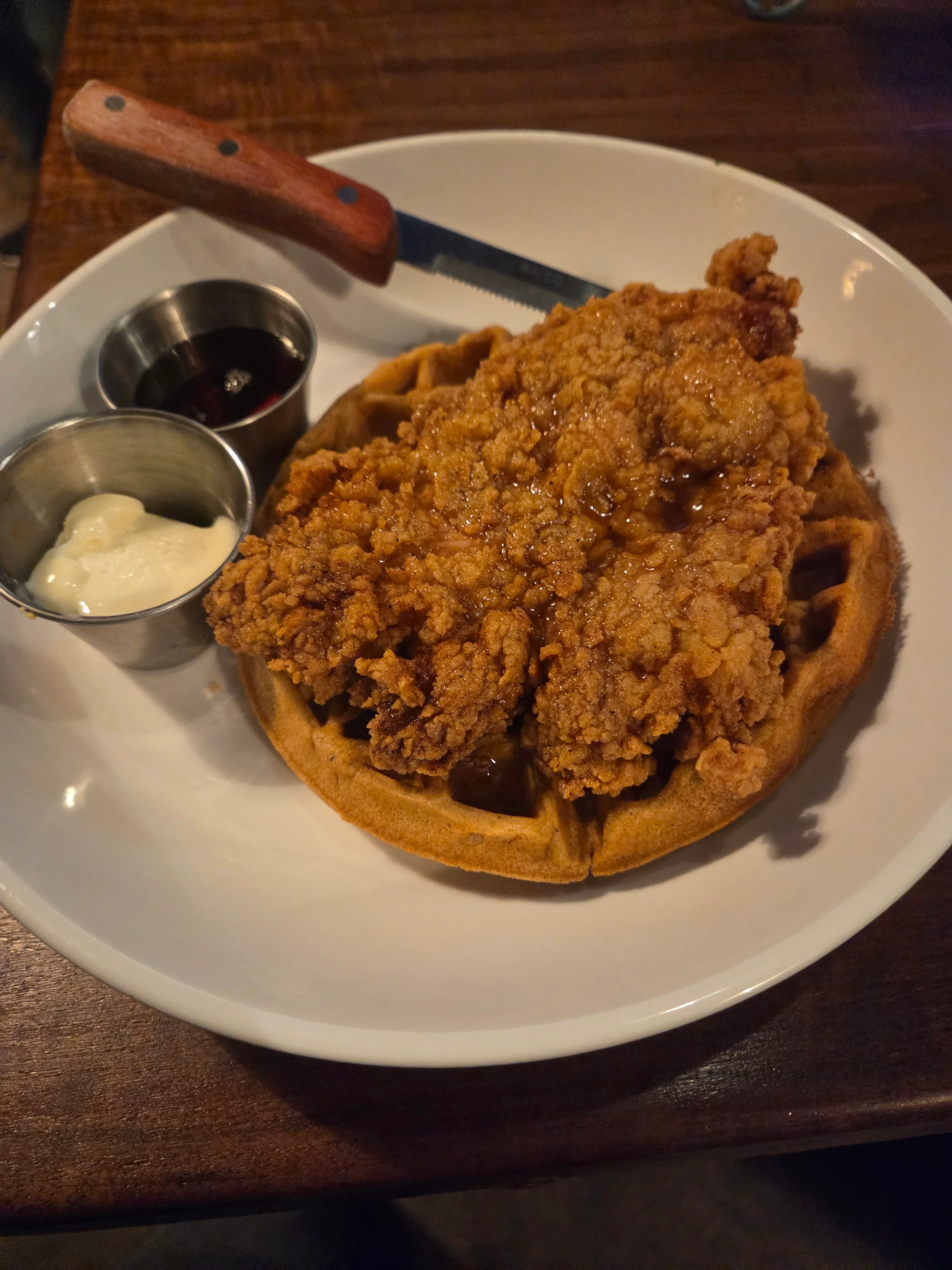 Southern fried chicken and waffles with syrup