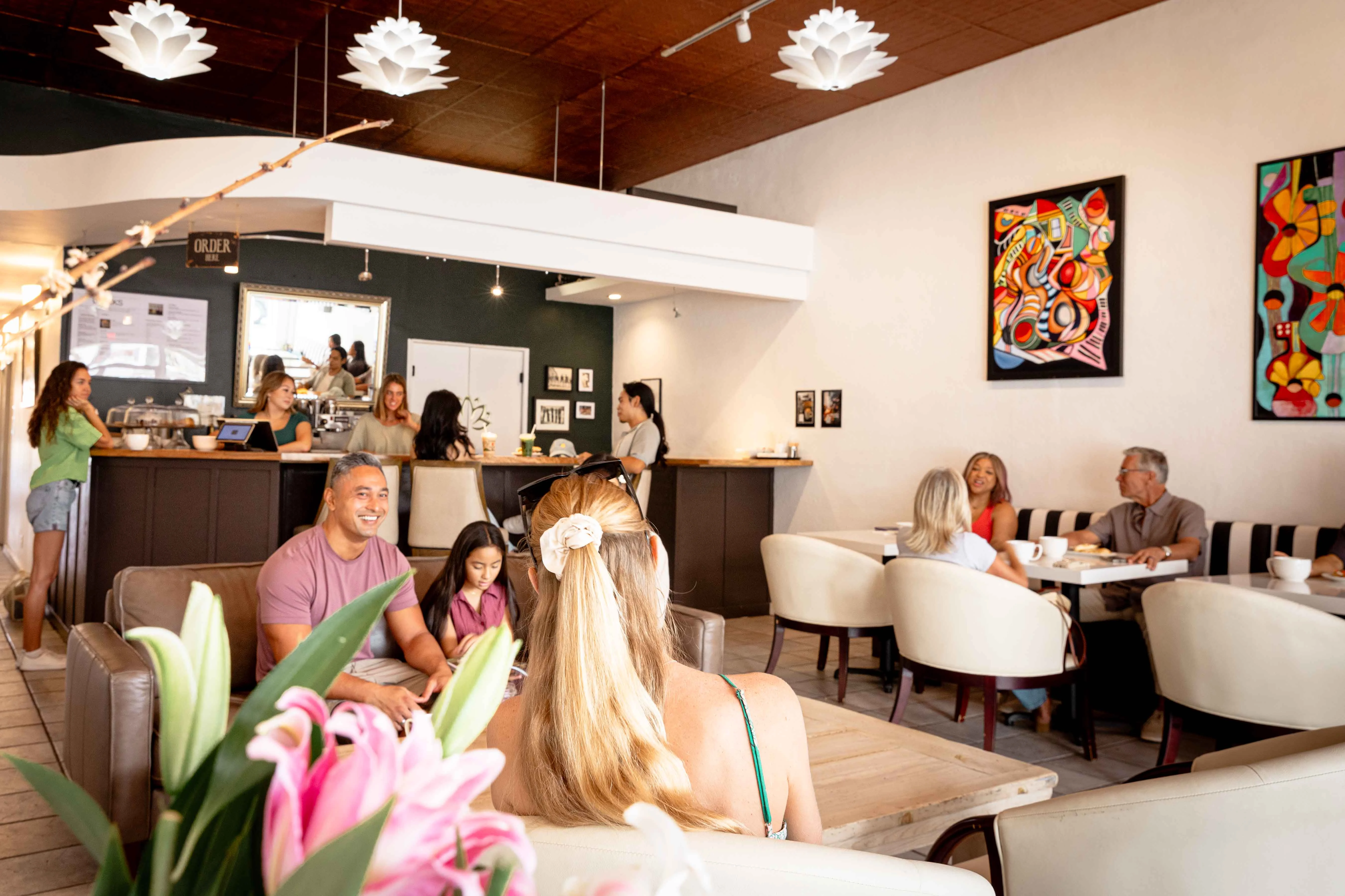 Cozy café interior with vibrant art and relaxed atmosphere