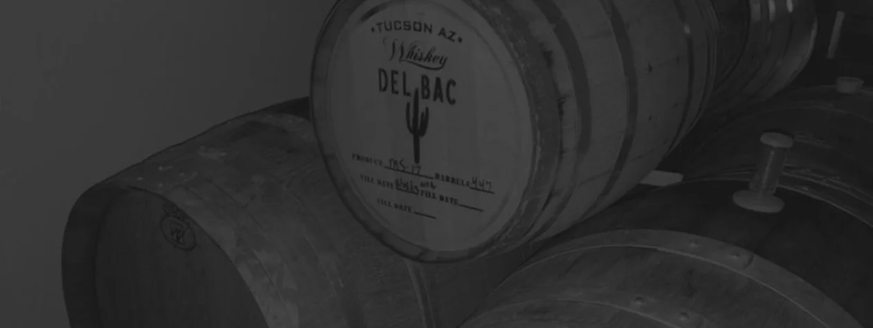 Whiskey barrels aging in a distillery