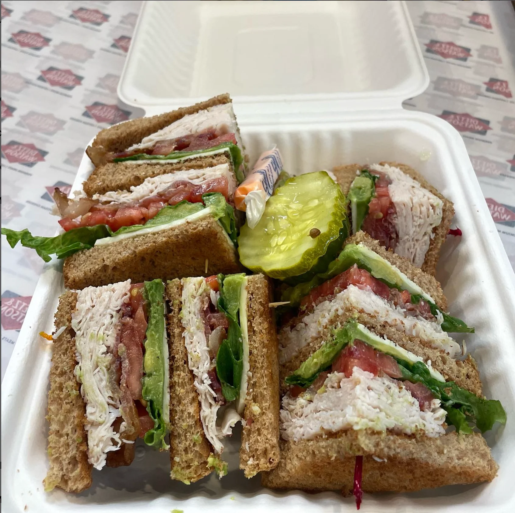 Classic club sandwich with turkey and fresh vegetables