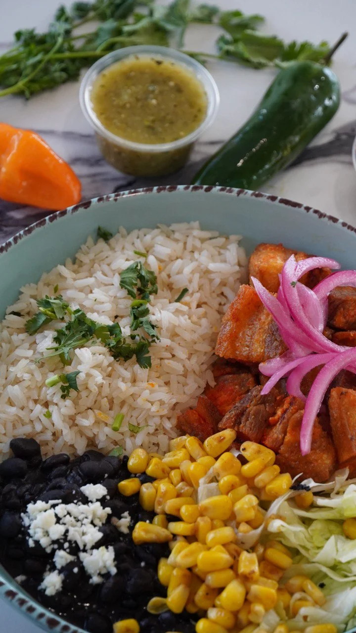 Vibrant Mexican burrito bowl with rice and toppings