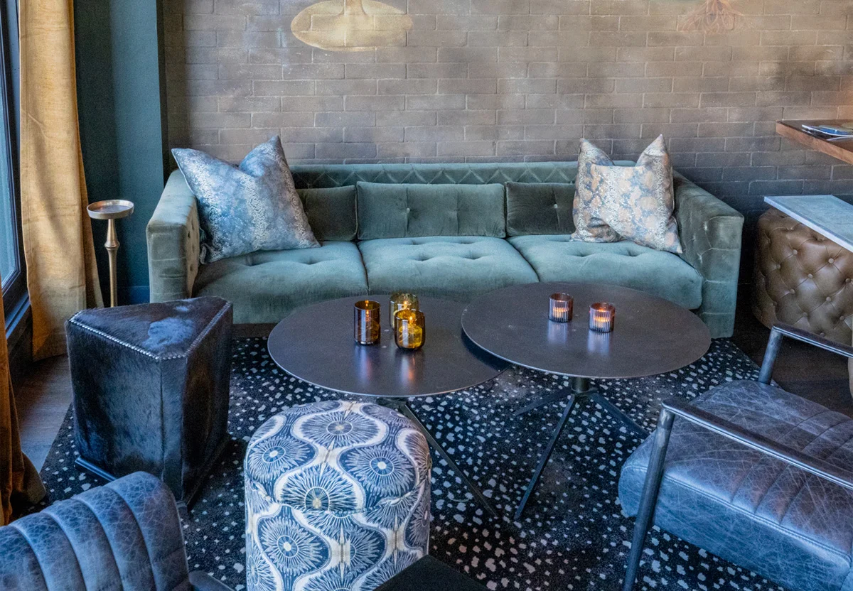 Stylish restaurant lounge with plush seating and ambient lighting