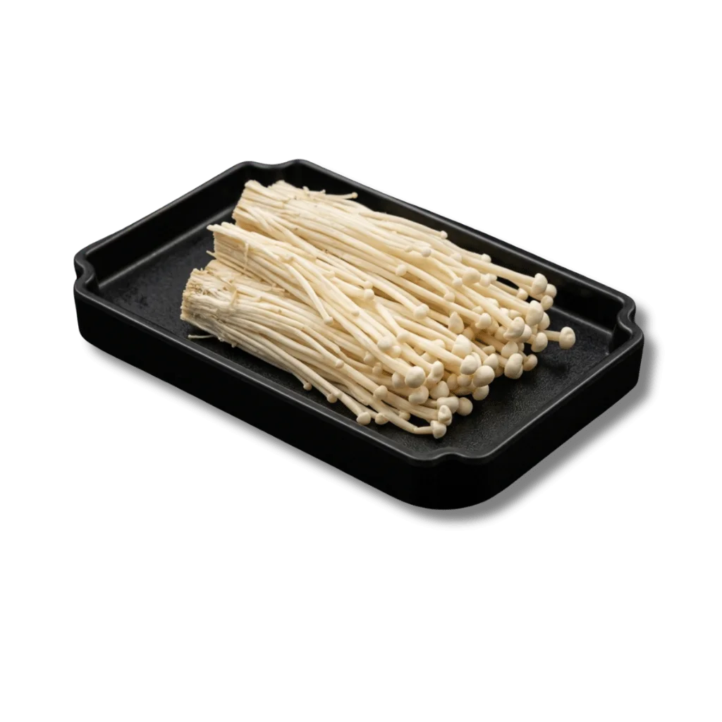 Fresh enoki mushrooms arranged on a black tray.