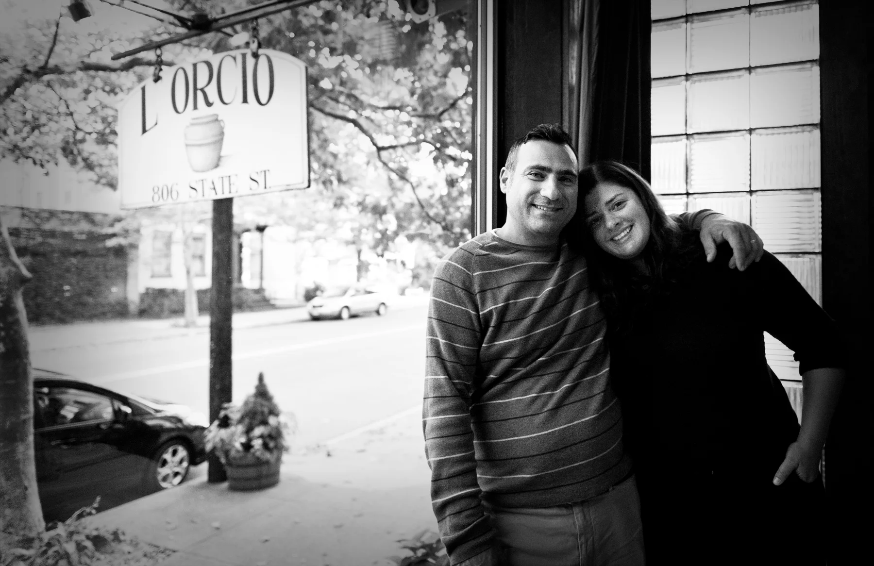 Cozy restaurant exterior with welcoming sign