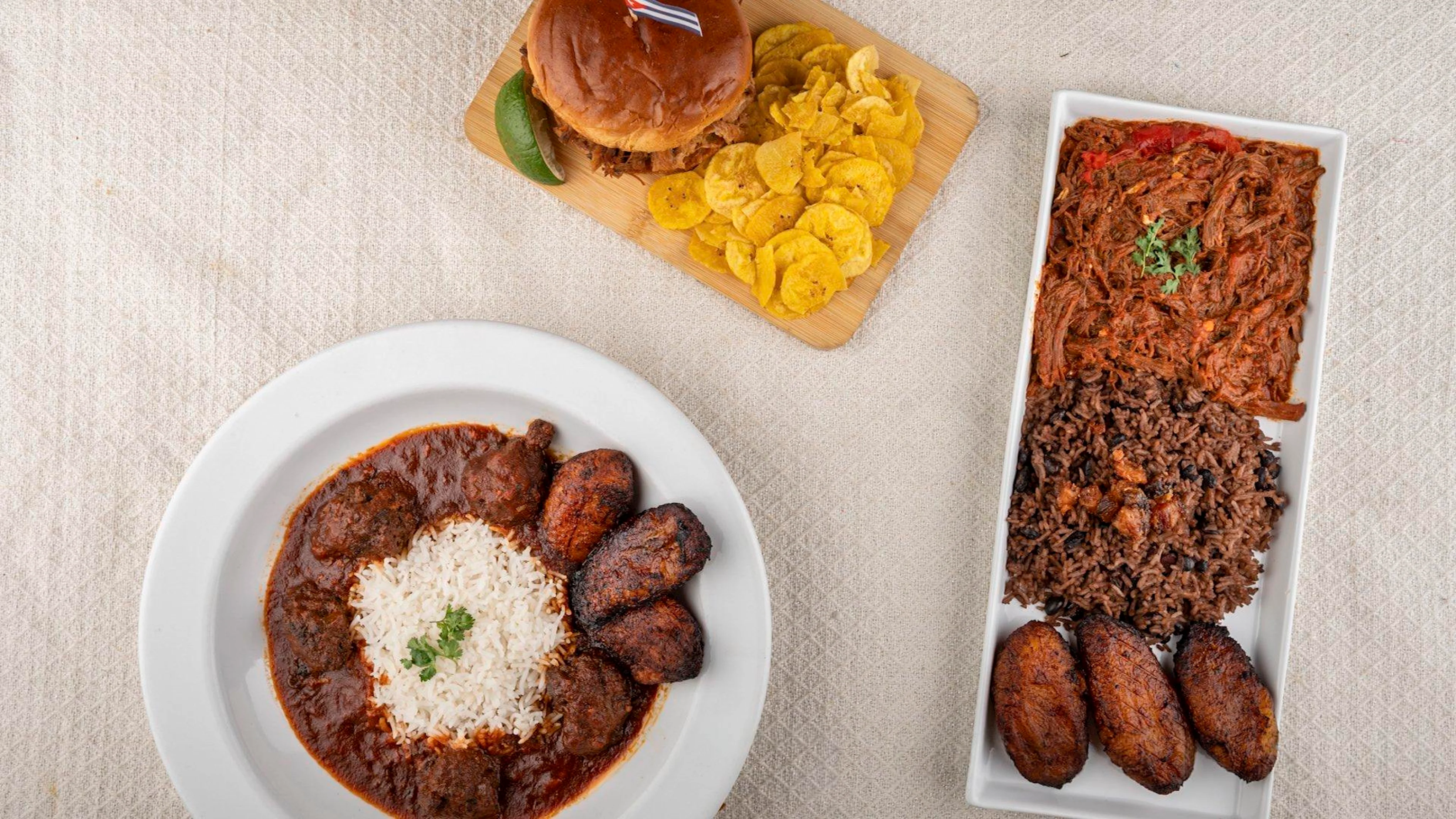 Cuban ropa vieja with rice and fried plantains