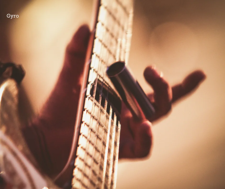 Close-up of a guitarist's hand playing with a slide