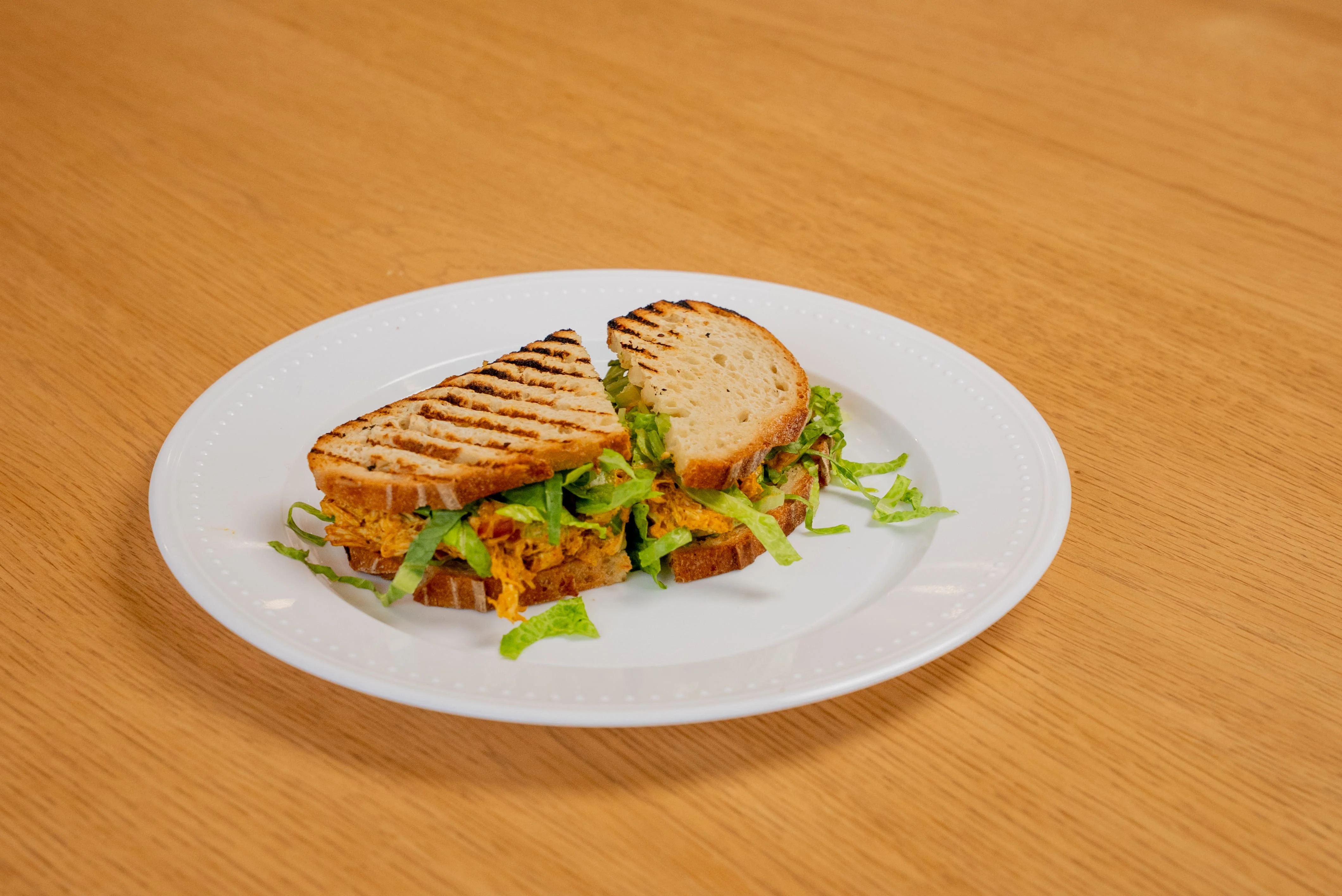 A beautifully plated dish featuring vibrant vegetables and garnishes.