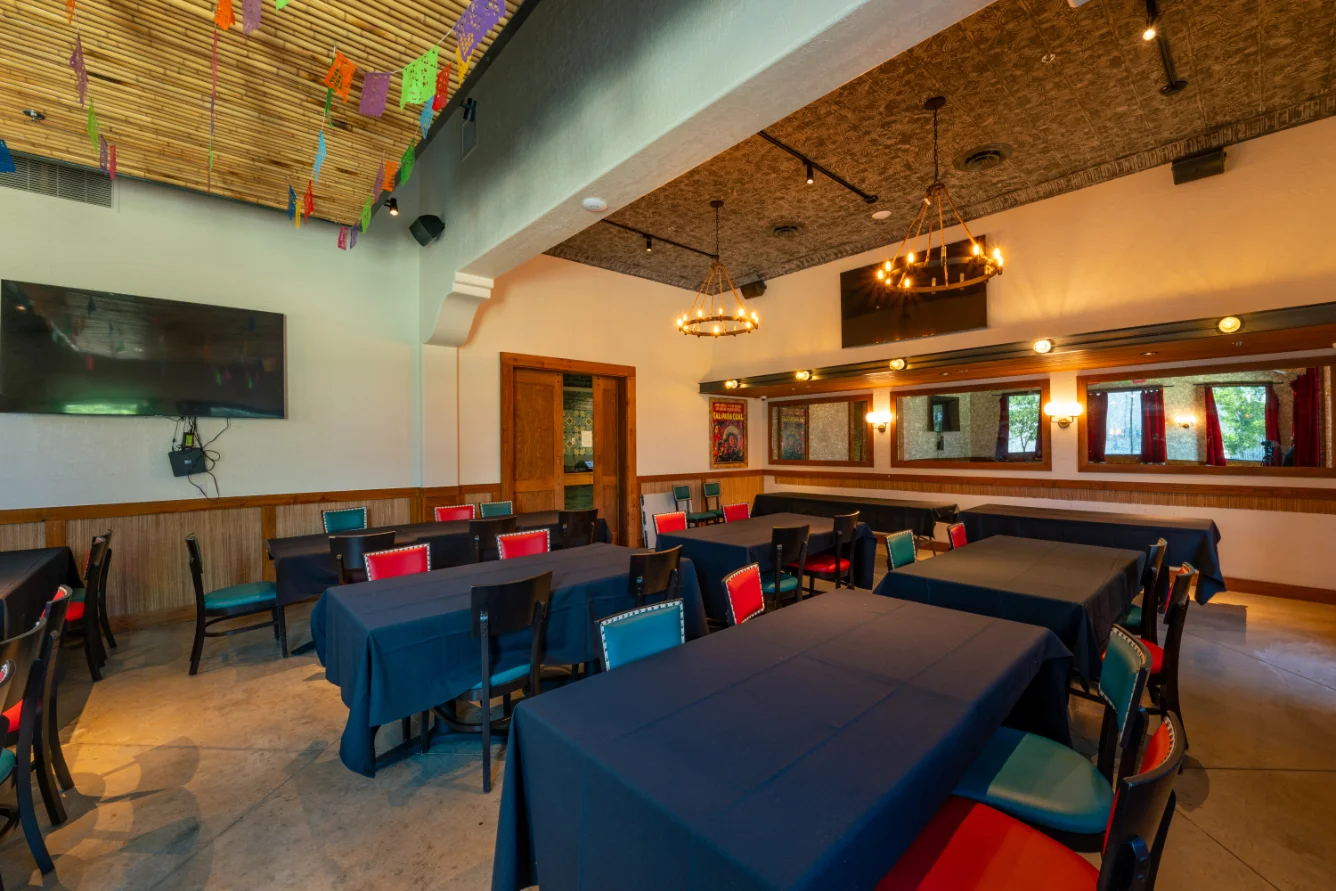 Cozy restaurant interior with colorful decor and tables