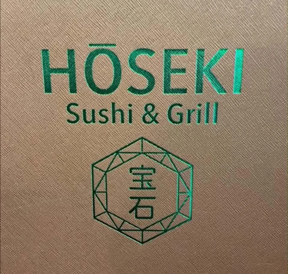 Logo of Hōseki Sushi & Grill featuring a geometric design